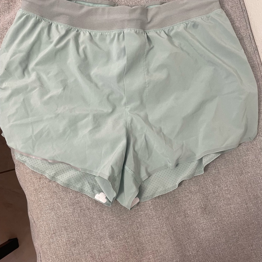 Men’s Lululemon light green shorts
